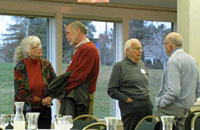 photo of members in conversation